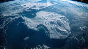 Satellite view of Antarctica from Space highlighting frozen mountains and valleys