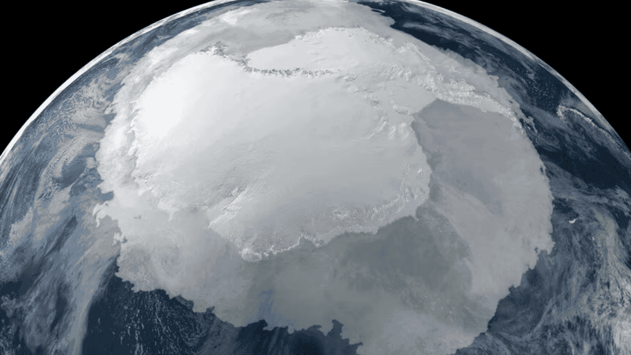 A breathtaking view of antarctica from space, showcasing its vast icy landscape and intricate glacial formations.