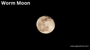 **"Luminous Worm Moon shining in the night sky, symbolizing seasonal change and renewal."**