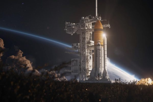 NASA Artemis II crew of four astronauts standing in front of Space Launch System rocket at Kennedy Space Center preparing for lunar mission